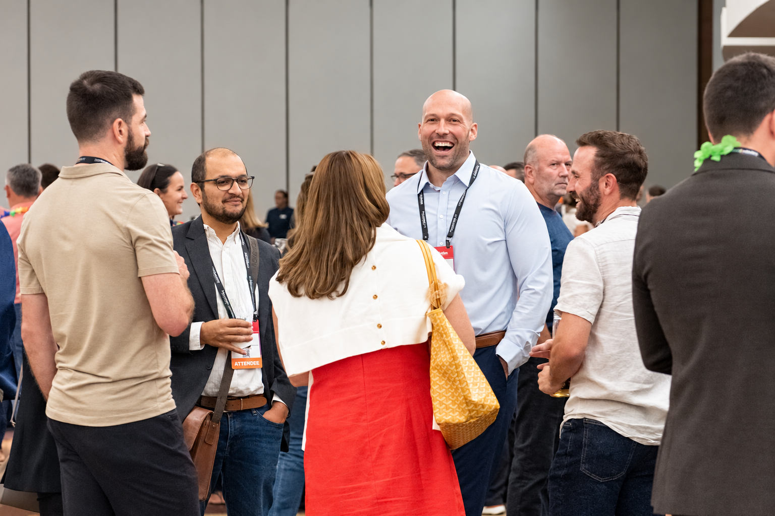 Attendees networking and connecting at an RRMC conference reception